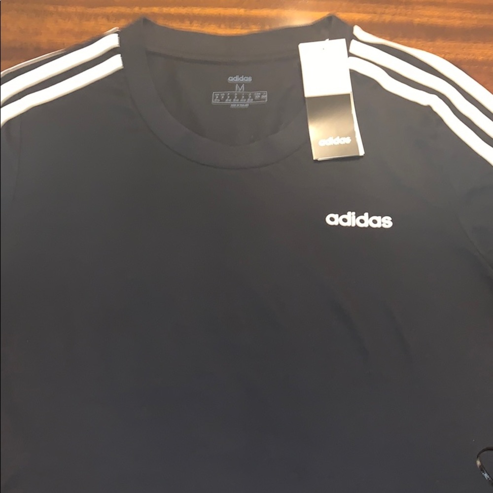 Brand New adidas shirt with tags
